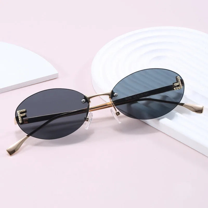 Diamond "F" Rimless Sunglasses – Luxury Oval Metal Frame UV400 Shades for Women