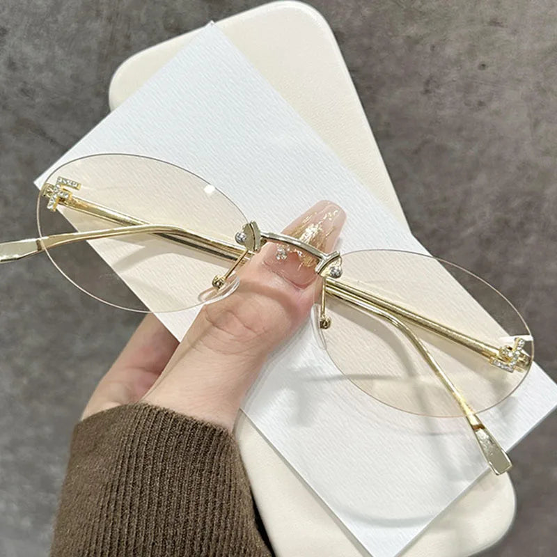 Diamond "F" Rimless Sunglasses – Luxury Oval Metal Frame UV400 Shades for Women
